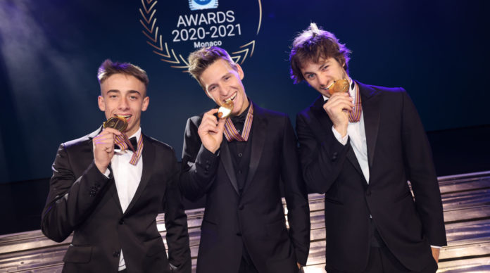 2021 MotoGP World Champion Fabio Quartararo (center), 2021 Moto2 World Champion Remy Gardner (right), and 2021 Moto3 World Champion Pedro Acosta (left). Photo by Goodshoot, courtesy Dorna. 2021 MotoGP World Champion Fabio Quartararo (center), 2021 Moto2 World Champion Remy Gardner (right), and 2021 Moto3 World Champion Pedro Acosta (left). Photo by Goodshoot, courtesy Dorna.