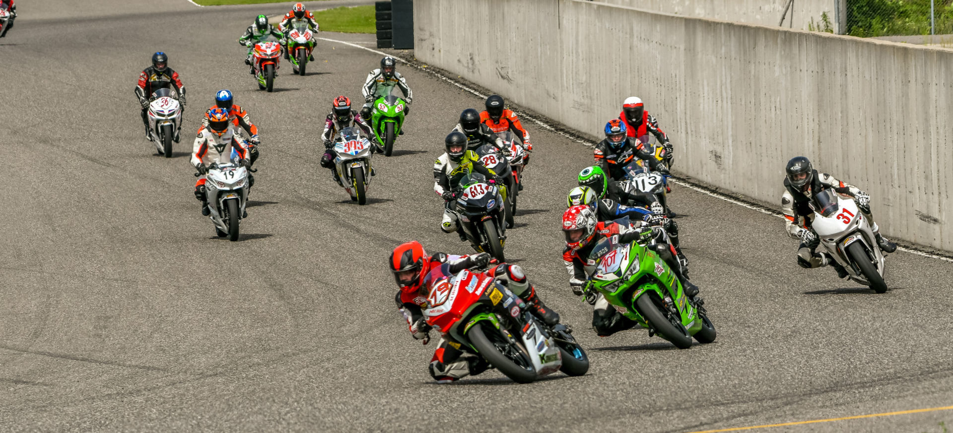 Action from the CSBK Super Sonic Road Race School Amateur Lightweight Sport Bike series at Calabogie Motorsports Park in 2021. Photo by Damian Pereira, courtesy CSBK.