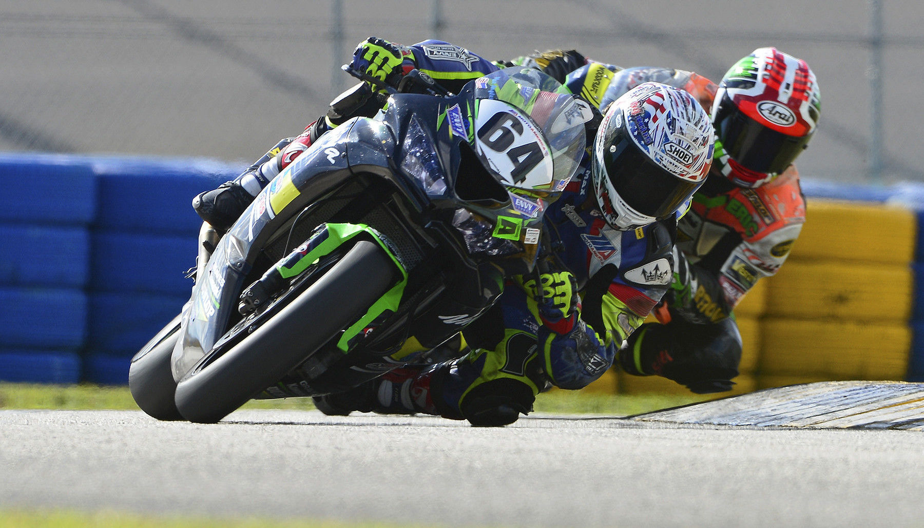 Max Angles (64) and Eric Wood (5) fight for the lead of an Unlimited Supersport race at Homestead-Miami Speedway. Photo by Lisa Theobald, courtesy CCS.