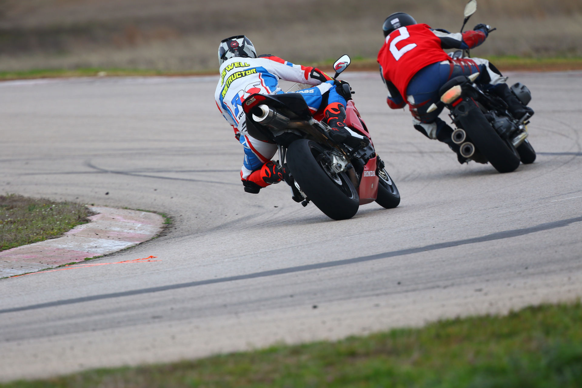 A RideSmart Motorcycle School instructor follows a student on track. Photo by Blair Hart, courtesy RideSmart.