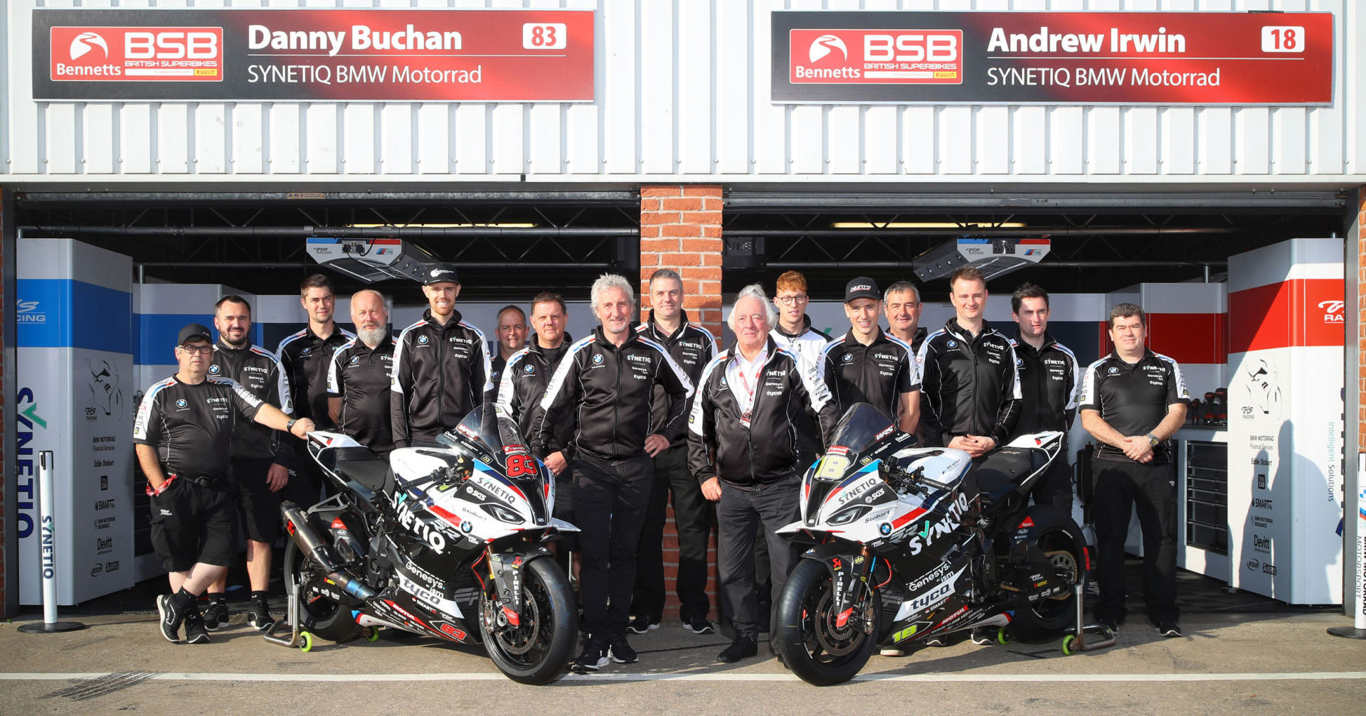 The SYNETIQ BMW British Superbike team with rider Danny Buchan (fifth from left) and Andrew Irwin (fifth from right). Photo courtesy SYNETIQ BMW.