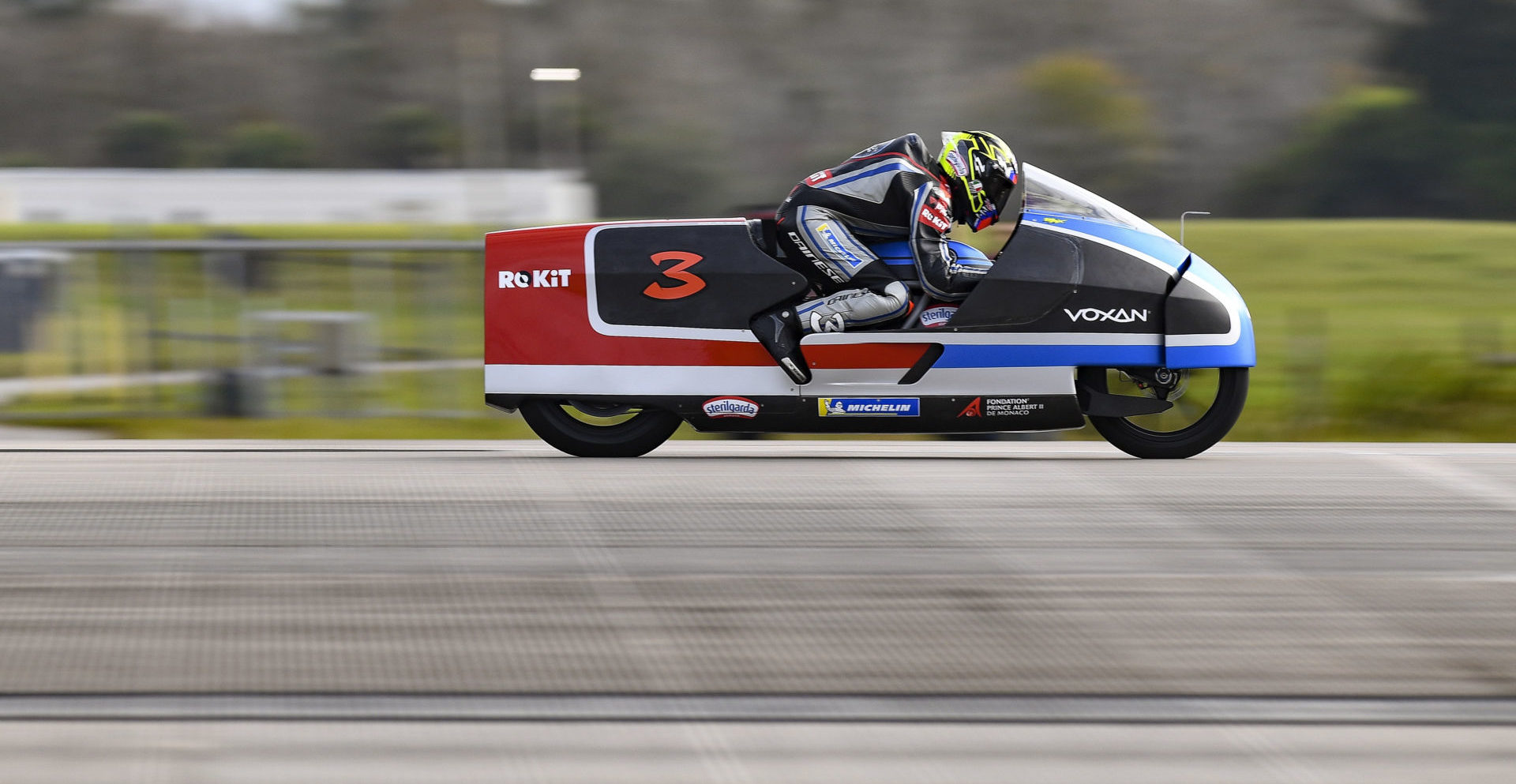 Max Biaggi (3) at speed on the electric Voxan Wattman at NASA's Kennedy Space Center. Photo courtesy Voxan.