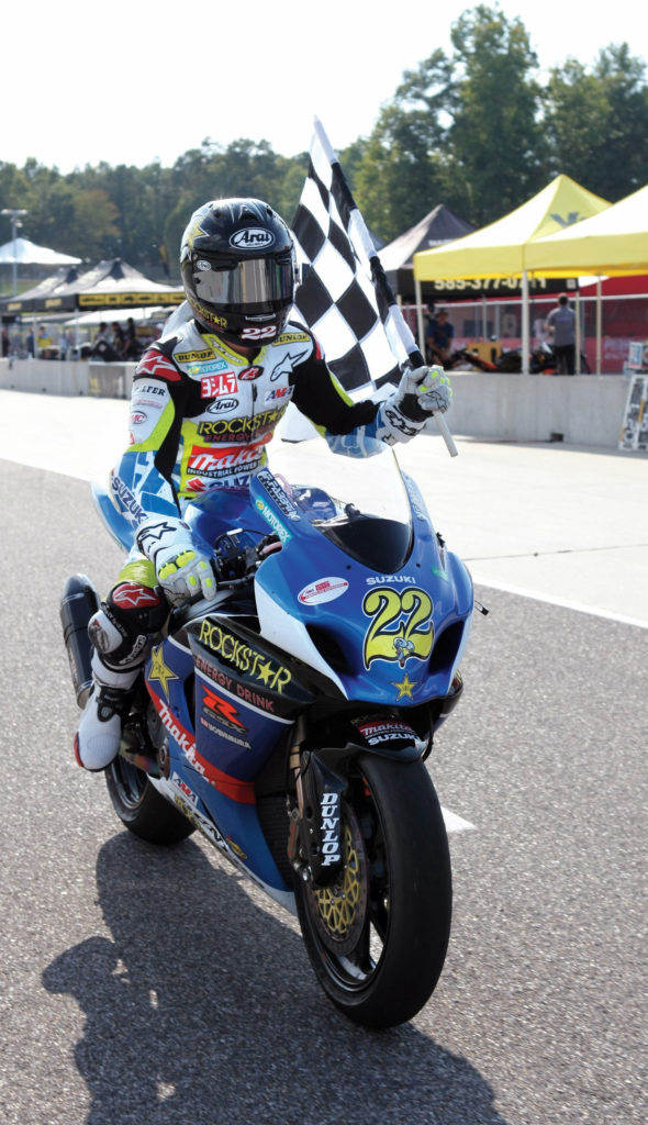 Tommy Hayden (22) comes in from taking a victory lap after winning an AMA Pro Superbike race at Barber Motorsports Park, 2010. Photo by Brian J. Nelson.