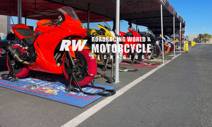 The 619 Kneedraggrz "Superpit" set up for a Chuckwalla Valley Raceway track event. The Superpit package includes transport and use of a rental bike with stands, tire warmers, generator, chair, and canopy plus drinks and a barbeque lunch, and a technician to work on the bike. Photo by David Swarts.