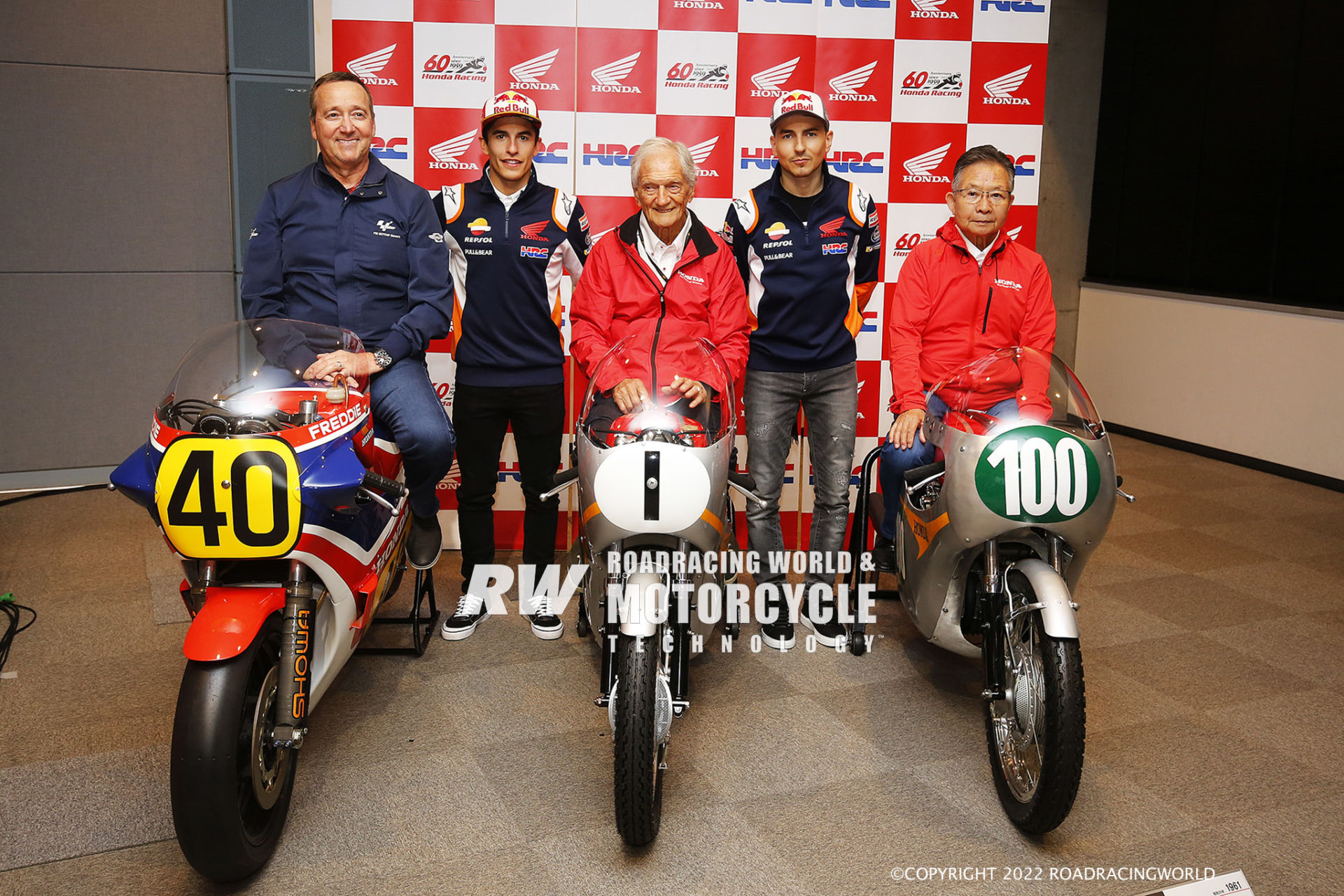 MotoGP riders Marc Marquez and Jorge Lorenzo met riders from Honda’s early GP days during an event held in conjunction with the 2019 Japanese GP at Motegi. From left are Freddie Spencer on the #40 Honda NS500 three-cylinder two-stroke he rode to his first 500cc GP World Championship race win on July 4th, 1982; Jim Redman on the #1 Honda 250cc RC164 4-cylinder he rode to the 1963 World Championship; and Kunimitsu Takahashi on the #100 1962 Honda 250cc RC162 4-cylinder. Photo courtesy Dorna.