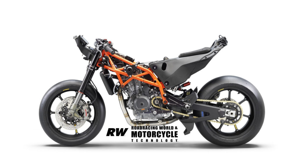 The RC 8C without its bodywork, showing the self-supporting plastic tailsection and fuel tank; note the aero scoop in front of the rear wheel, the minimal chrome-moly steel tube frame, and braced swingarm. Photo courtesy KTM.