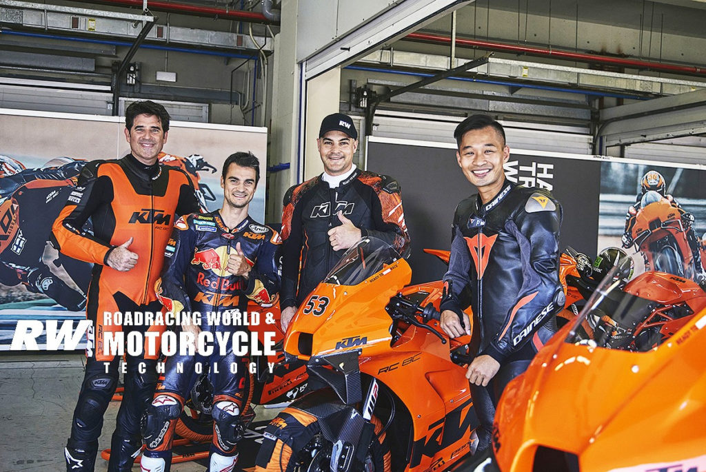 Chris Ulrich with MotoGP racer and test rider Dani Pedrosa and American RC 8C buyers Mauricio Gomez (left) and Viet Tran (right). Photo courtesy KTM.