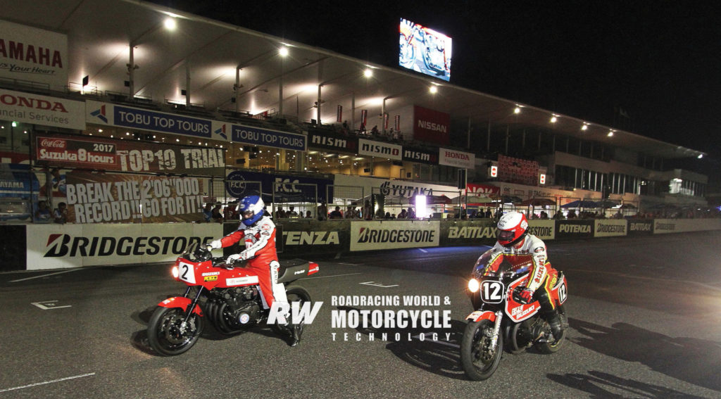 Wes Cooley (2) on the winning 1978 Yoshimura Suzuki and Graeme Crosby on the winning 1980 Yoshimura Suzuki (12) before making night demo laps at Suzuka in 2017. Photo by Shigeo Kibiki. Copyright 2018, Roadracing World Publishing, Inc.