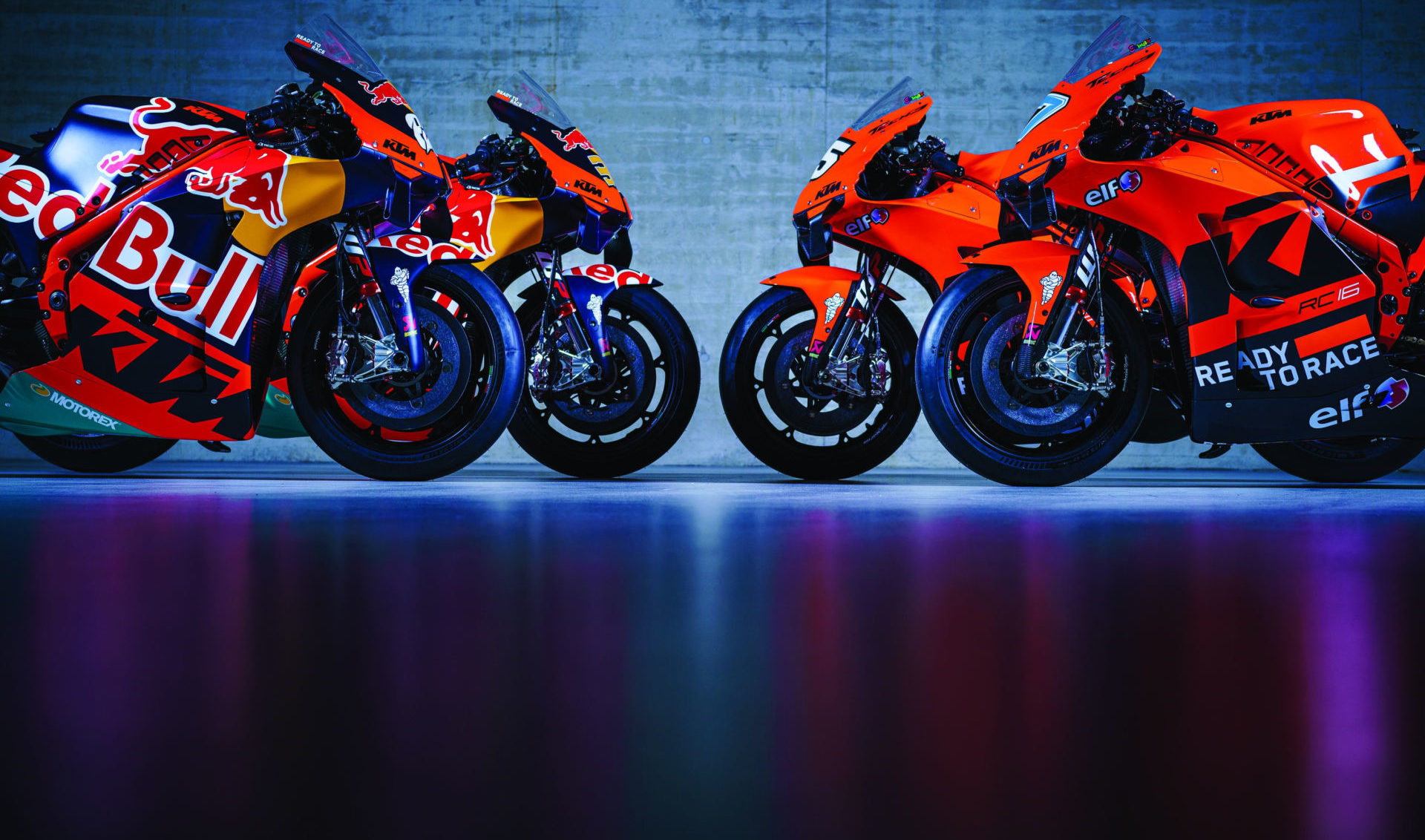 The Red Bull KTM MotoGP racebikes (left) and the Tech3 KTM Factory Racing MotoGP racebikes (right). Photo by Philip Platzer, courtesy KTM Factory Racing.