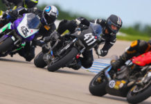 AHRMA racers Gabriel Figueroa (425G) and James-Derek Mayo (411) in action at Heartland Motorsports Park in 2021. Photo by etechphoto.com, courtesy AHRMA.