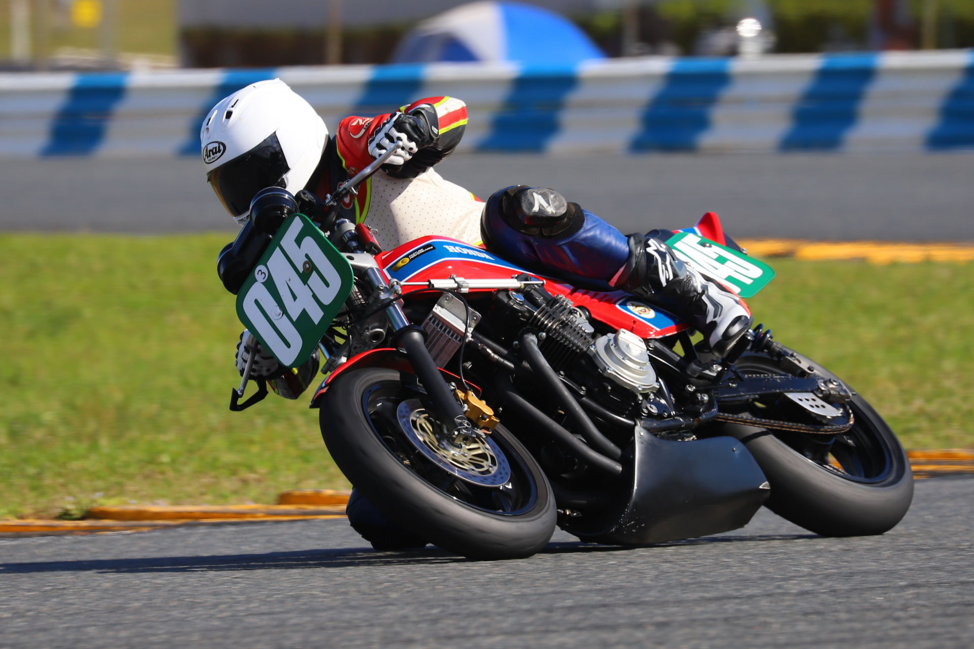 Curtis Adams (045) on his Honda CB750F at Daytona International Speedway. Photo by etechphoto.com, courtesy AHRMA.