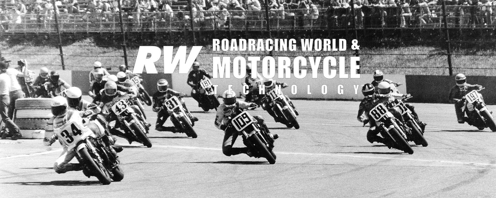 Wes Cooley (34) at the start of an AMA Superbike race at Pocono Raceway in 1980, chased by David Aldana (109), Roberto Pietri (88), Mike Baldwin (43), Harry Klinzmann (31) and the rest. Photo by Mary Grothe.