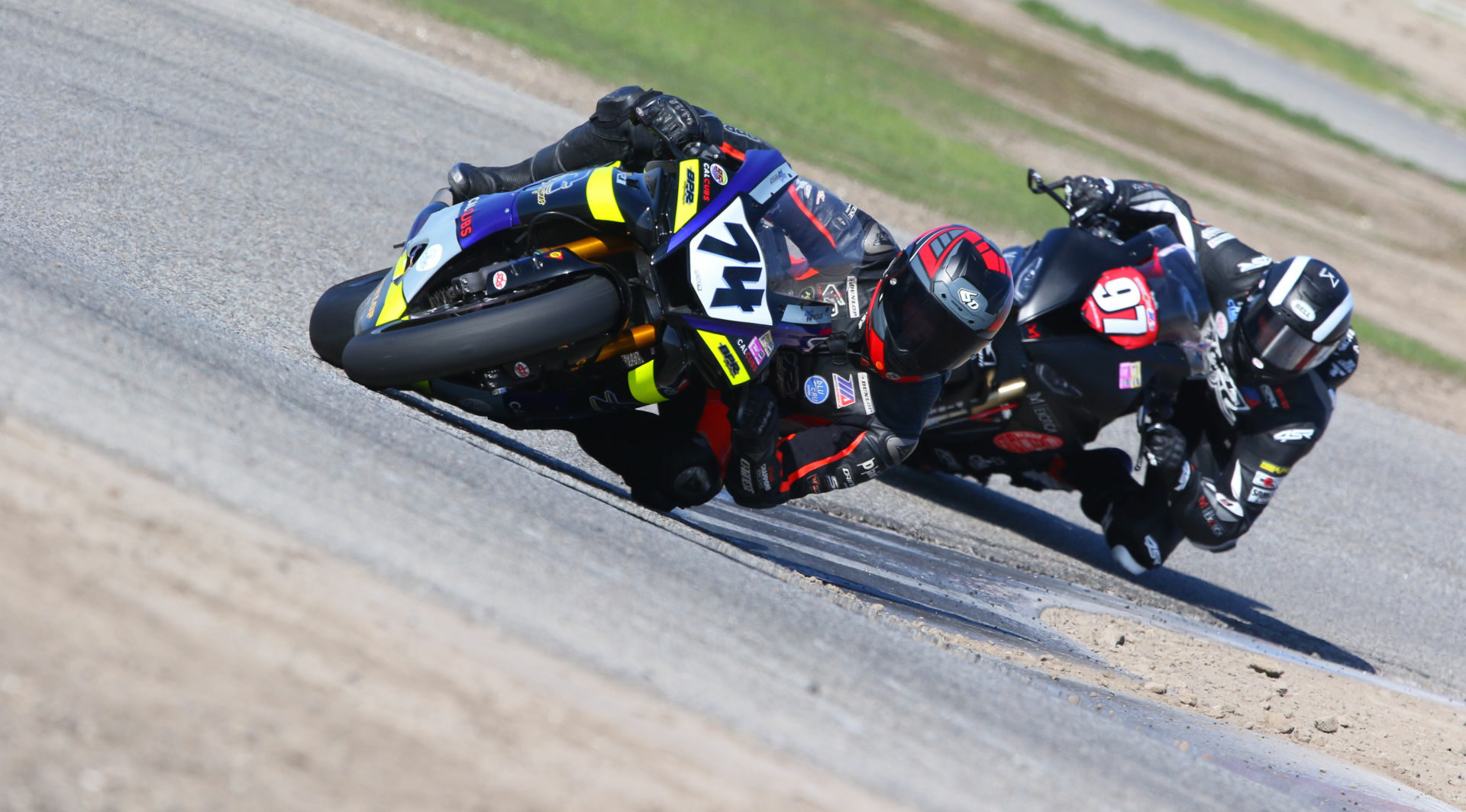 Bryce Prince (74) leads Ezra Beaubier (97) during the CRA Riderzlaw Gold Cup race at Buttonwillow. Photo by Caliphotography.com