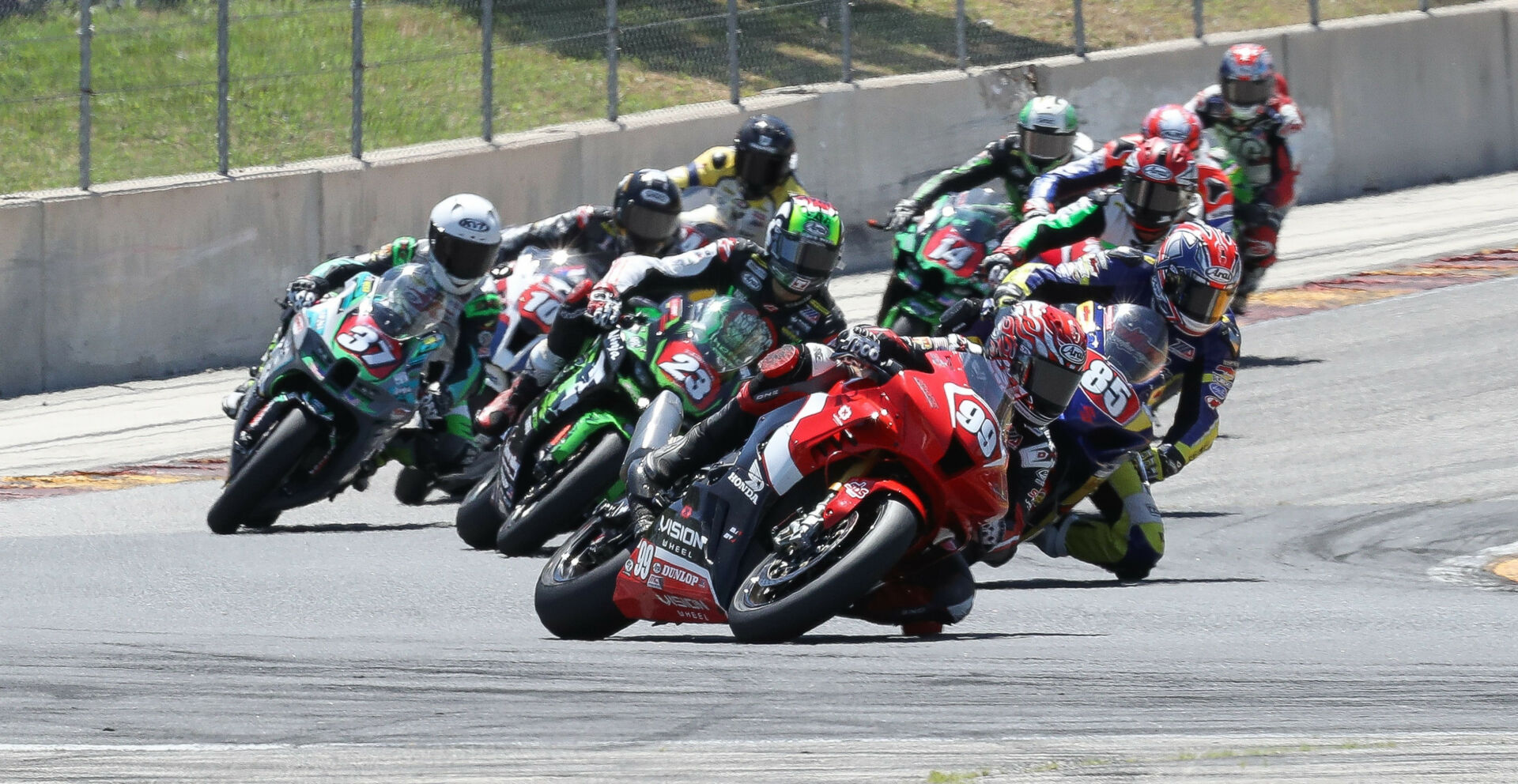 Geoff May (99), riding a Honda CBR1000RR-R Fireblade SP, leading a MotoAmerica Stock 1000 race at Road America in 2021. Photo by Brian J. Nelson.
