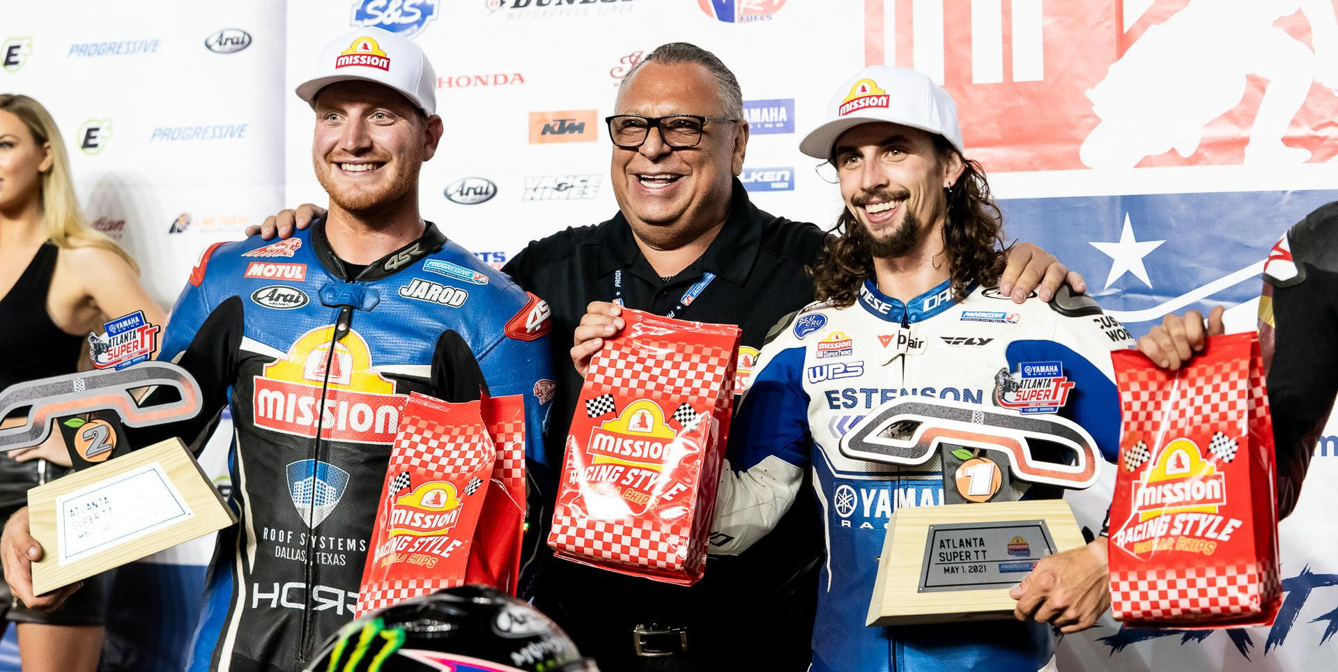 AFT SuperTwins racers JD Beach (right) and Jarod Vanderkooi (left) on the podium with Mission Foods CEO Juan Gonzalez (center). Photo courtesy AFT.