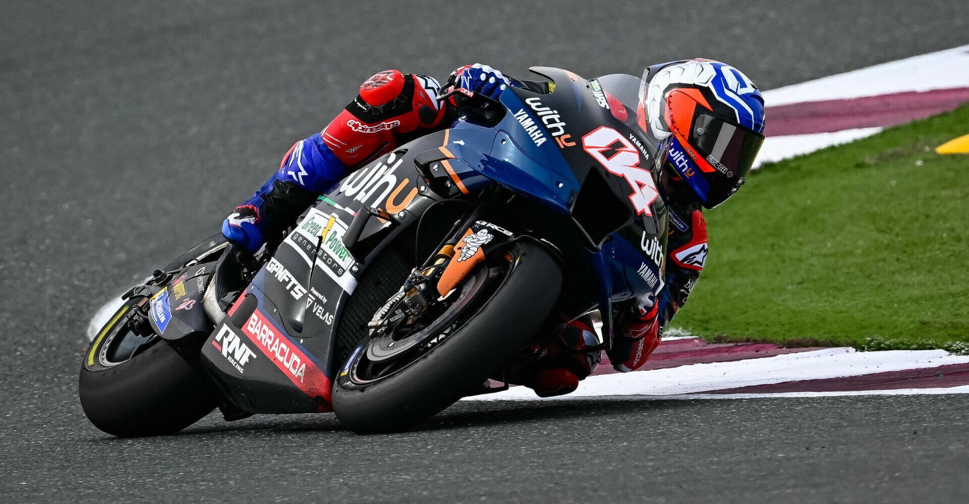 Andrea Dovizioso (04) in action during the MotoGP race weekend in Qatar. Photo courtesy Dorna.