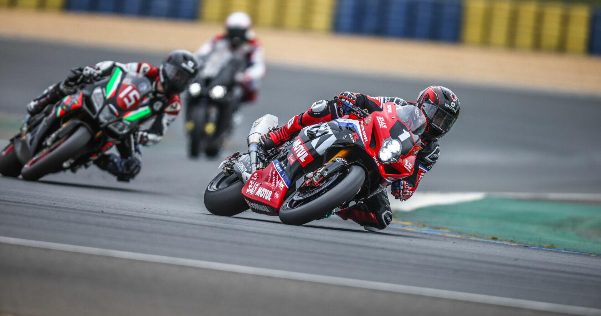 Yoshimura SERT Motul (1) leads a group of riders during testing at the Bugatti Circuit in Le Mans, France. Photo courtesy Team Suzuki Press Office.