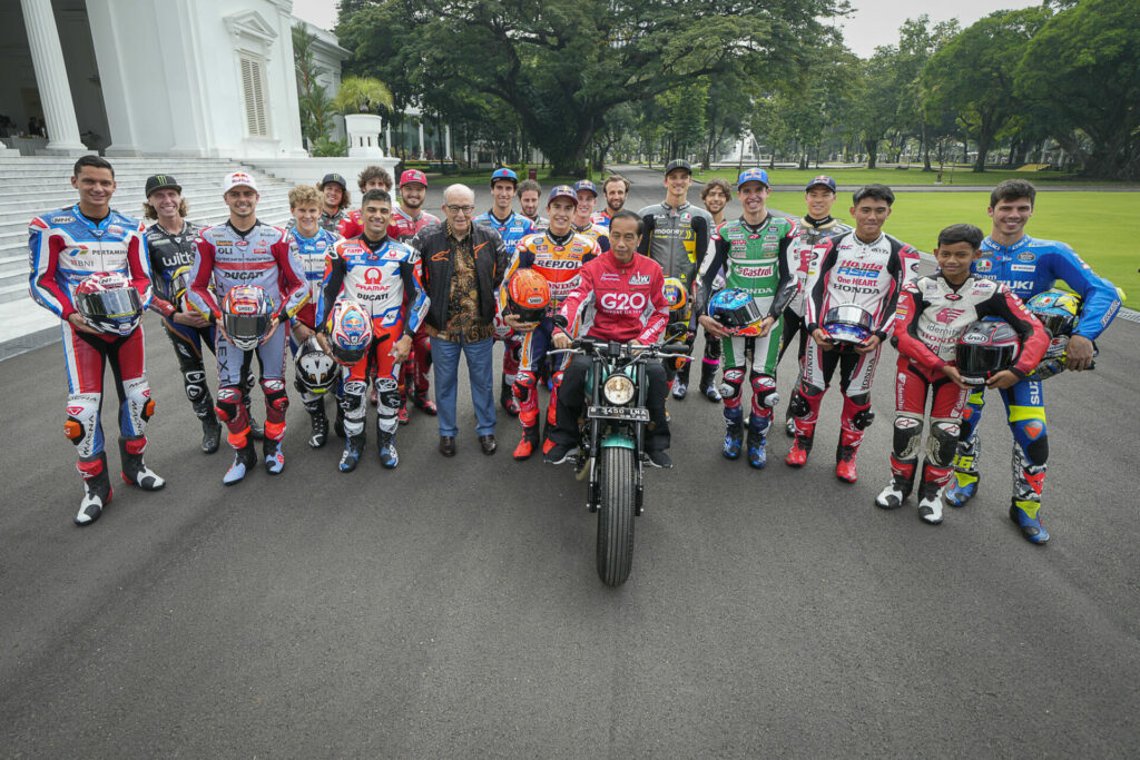 MotoGP riders and others with Indonesian President Joko Widodo (seated on motorcycle) at his palace in Jakarta. Photo courtesy Dorna.