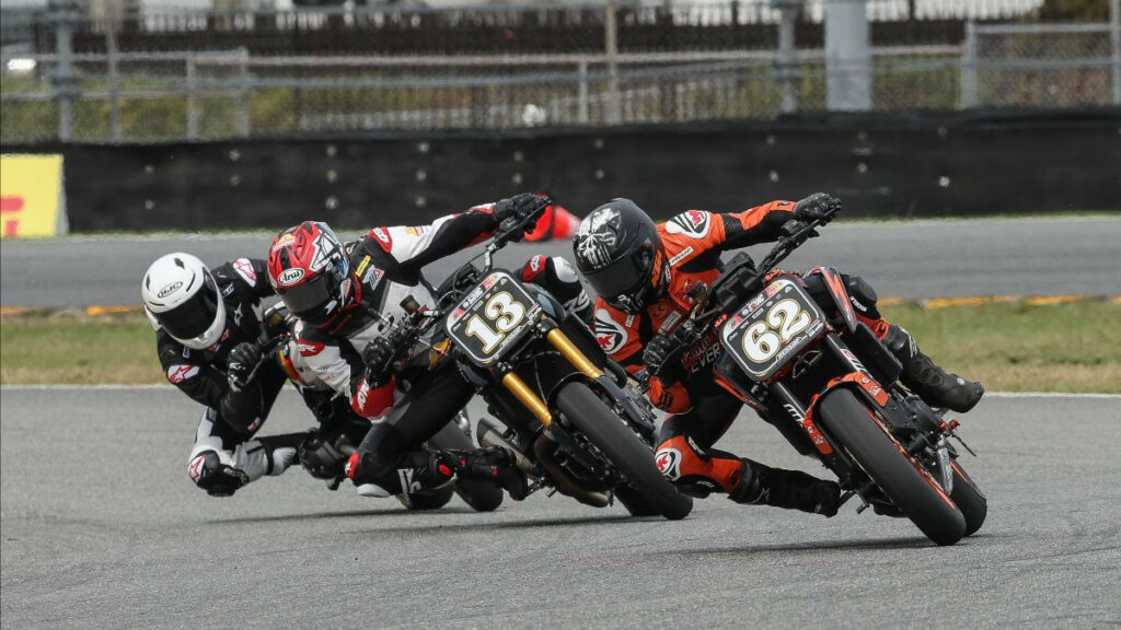 Andy DiBrino (62) barely beat Cory West (13) to win the Roland Sands Design Super Hooligan race on Friday. Photo by Brian J. Nelson, courtesy MotoAmerica.