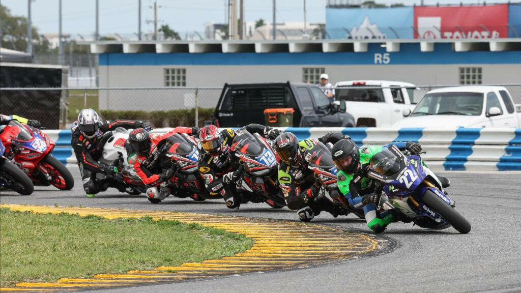 Blake Davis (22) leads a horde of Twins Cup racers en route to winning his first-career Twins Cup race. Photo by Brian J. Nelson, courtesy MotoAmerica.