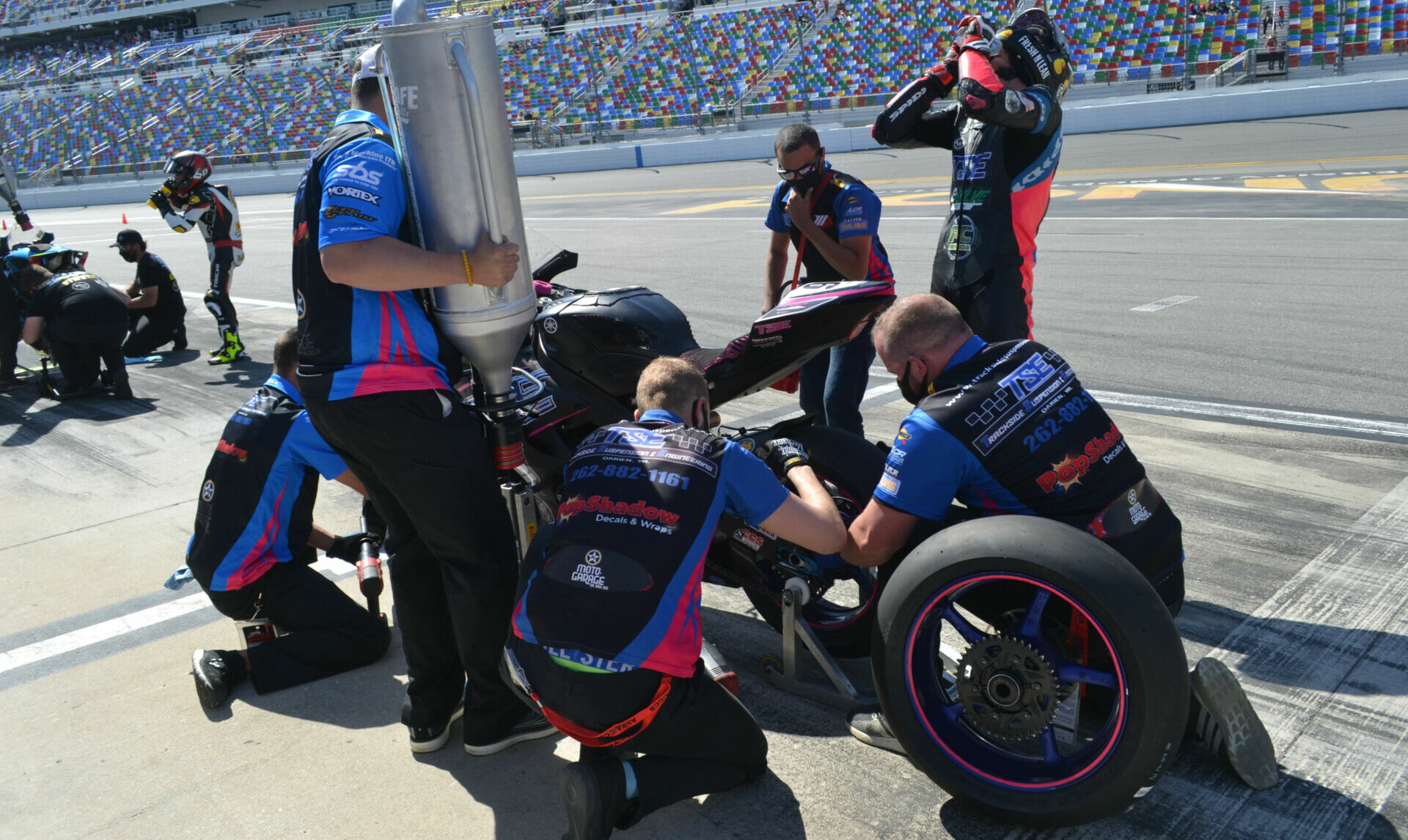 Brandon Paasch takes a drink while his TSE Racing crew refuels and changes tires on his Yamaha during the 2021 Daytona 200. Photo by David Swarts.