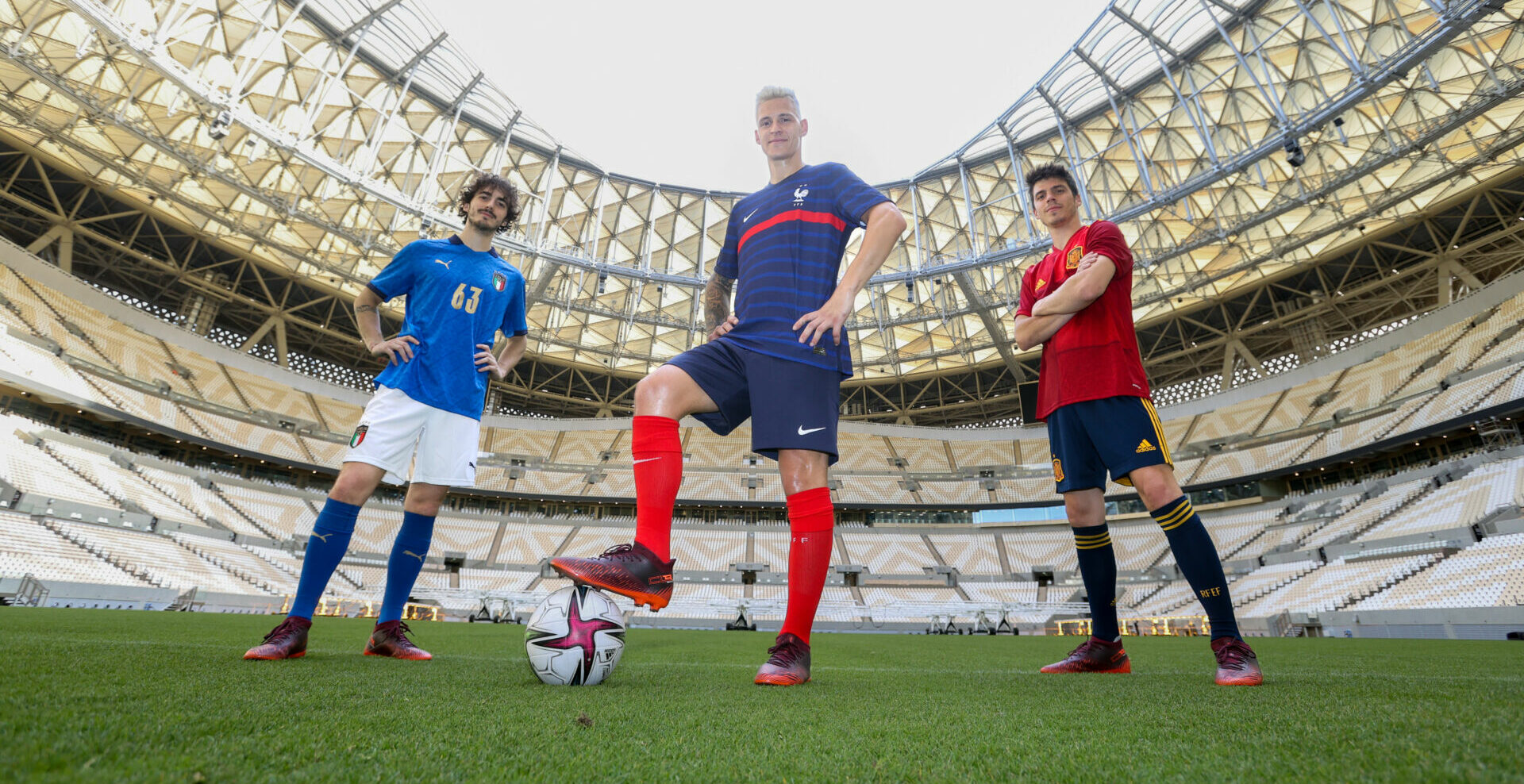 Fabio Quartararo (center), Francesco Bagnaia (left), and Joan Mir (right) at Lusail Iconic Stadium, site of the 2022 FIFA World Cup. Photo courtesy Dorna.