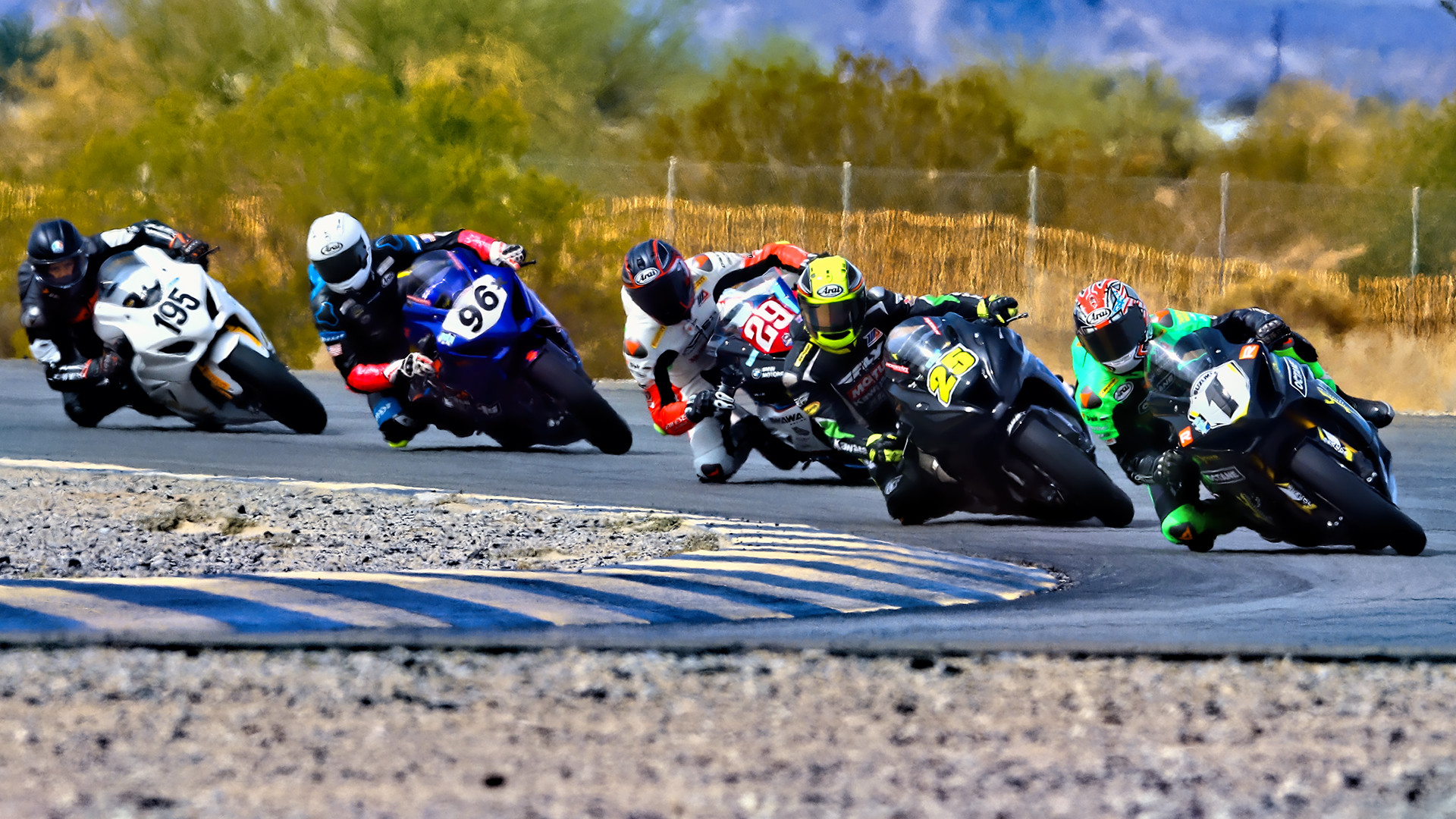 Michael Gilbert (1) leads, David Anthony (25), Jack Bakken (29), Brandon Paasch (96), and Adolfo Delgato (195) at the start of the CVMA Open Shootout race at Chuckwalla Valley Raceway. Photo by CaliPhotography.com, courtesy CVMA.