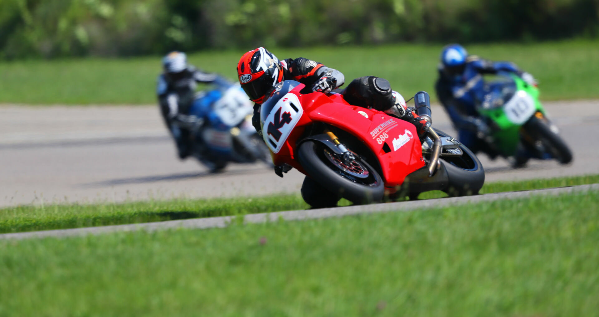 Brian Larrabure (14) on his AHRMA Next Gen Superbike Ducati at Gingerman Raceway. Photo by etechphoto.com, courtesy AHRMA.