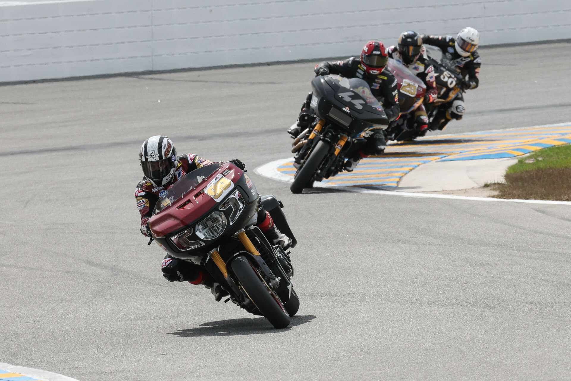 Jeremy McWilliams (99) leads James Rispoli (43), Tyler O'Hara (29) and Bobby Fong (50) in King Of The Baggers Race Two at Daytona. Photo courtesy Indian Motorcycle.