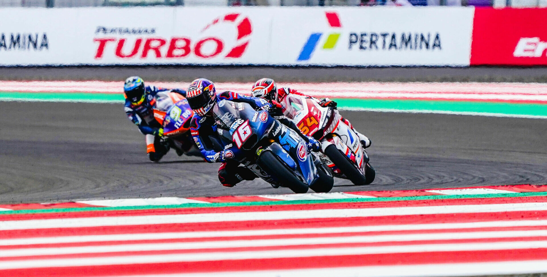 Joe Roberts (16) leads Bo Bendsneyder (64) and Jorge Navarro (9) during the Moto2 race in Indonesia. Photo courtesy Italtrans Racing.