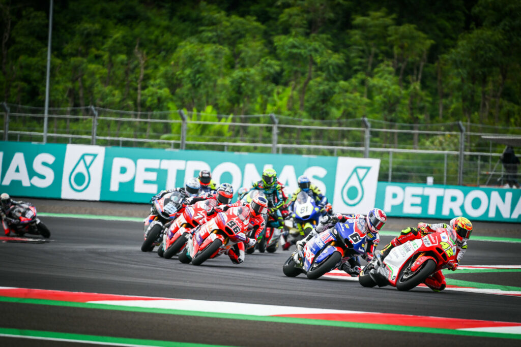 Cameron Beaubier (6) chases Marcos Ramirez (42) and leads Jake Dixon (96) during the Moto2 race at Mandalika International Street Circuit, in Indonesia. Photo courtesy American Racing Team.