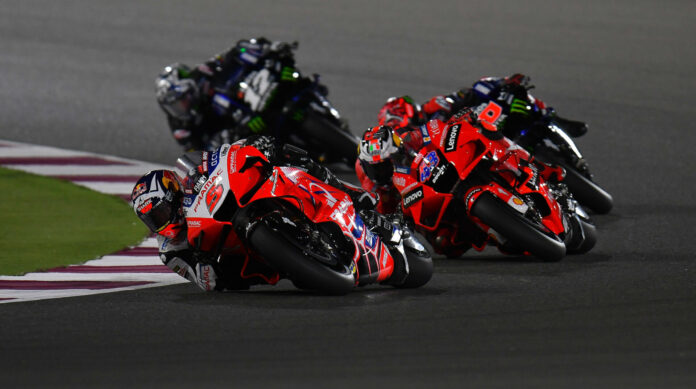Johann Zarco (5), Jack Miller (43), Fabio Quartararo (20), and Maverick Vinales (12) race for the lead during the opening round of the 2021 MotoGP World Championship in Qatar. Photo courtesy Michelin. Johann Zarco (5), Jack Miller (43), Fabio Quartararo (20), and Maverick Vinales (12) race for the lead during the opening round of the 2021 MotoGP World Championship in Qatar. Photo courtesy Michelin.