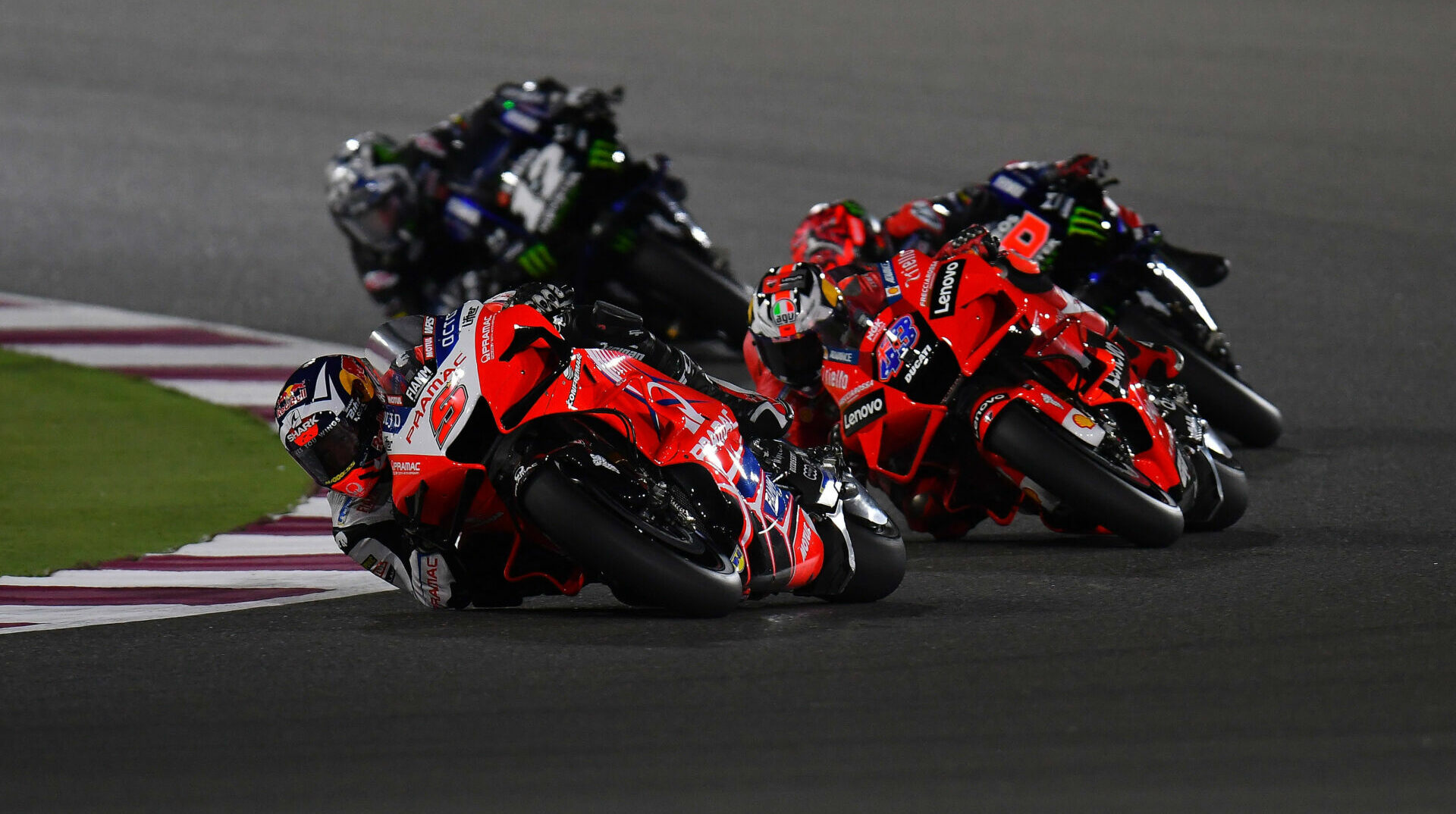 Johann Zarco (5), Jack Miller (43), Fabio Quartararo (20), and Maverick Vinales (12) race for the lead during the opening round of the 2021 MotoGP World Championship in Qatar. Photo courtesy Michelin.