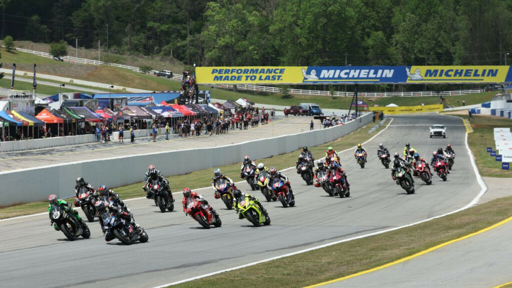 The Yuasa Stock 1000 class roars into Turn One at Michelin Raceway Road Atlanta with eventual race winner Corey Alexander (23) leading the way. Photo by Brian J. Nelson.