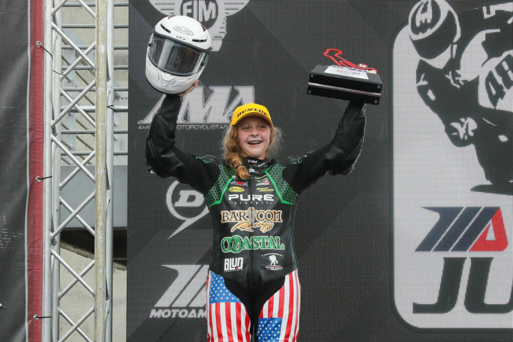 Kayla Yaakov on the MotoAmerica Junior Cup podium at Barber Motorsports Park in 2021. Photo by Brian J. Nelson.