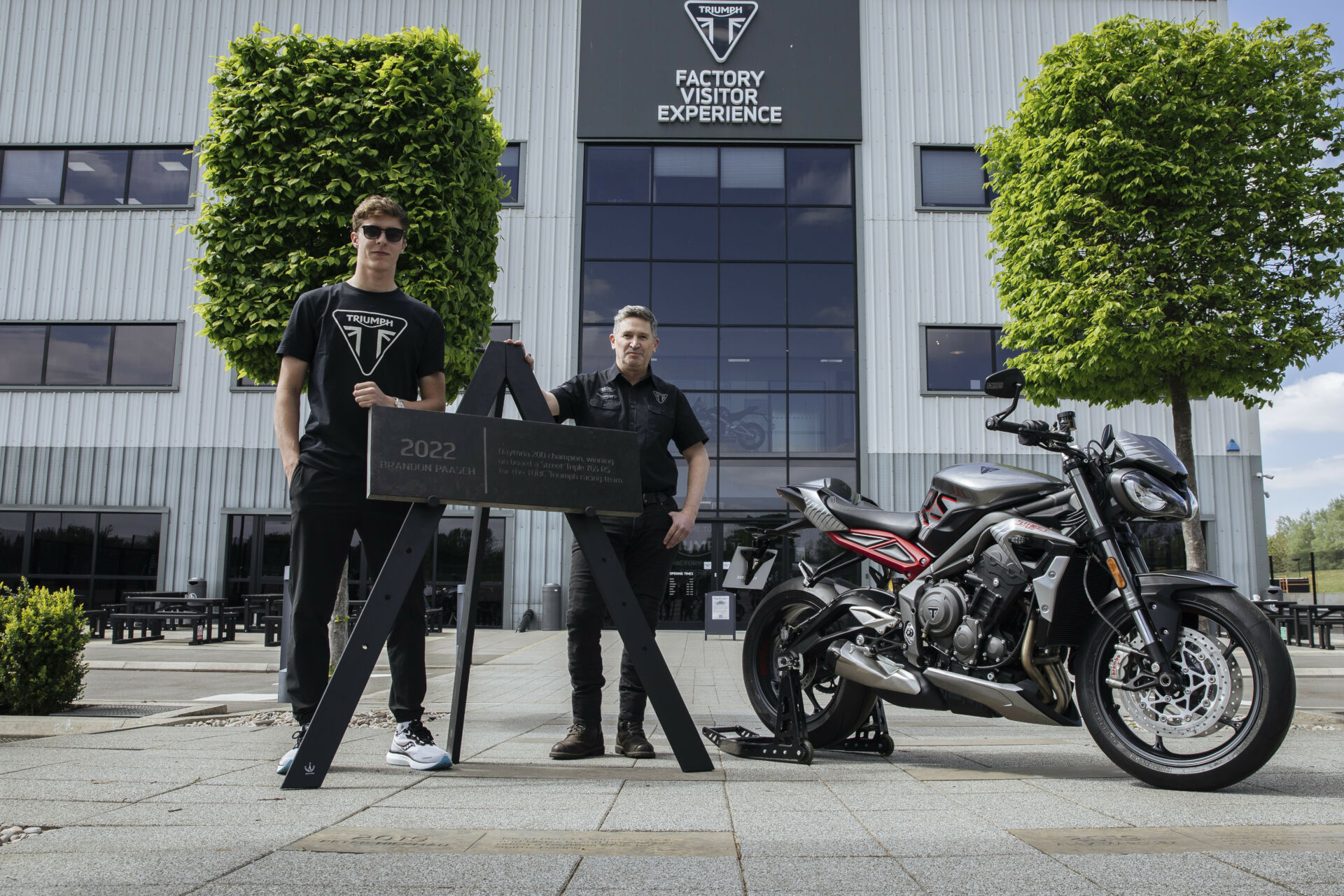 Brandon Paasch (left) with Triumph Chief Product Officer Steve Sargent (right) at Triumph headquarters in England. Photo courtesy Triumph.