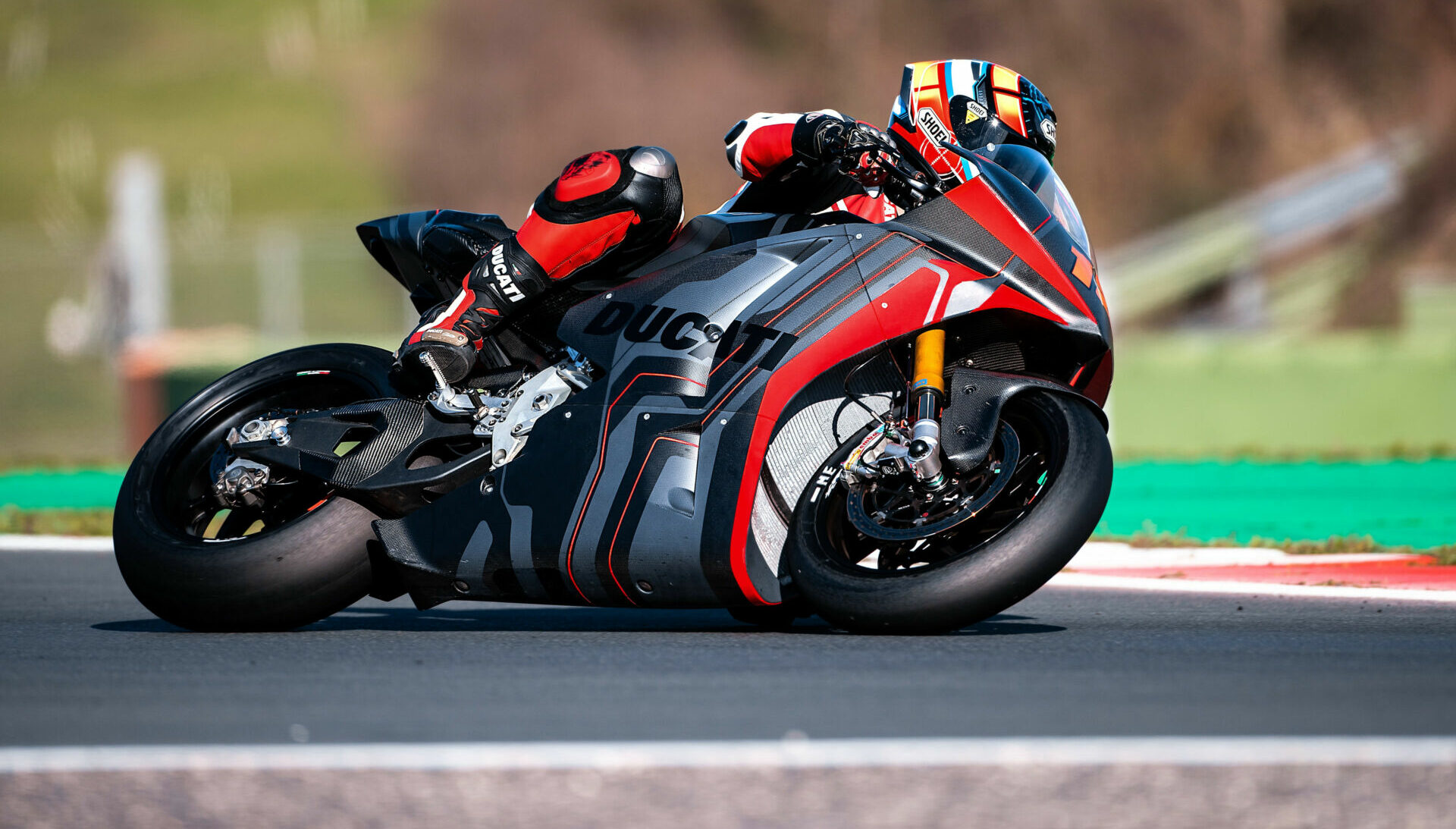Test rider Alex De Angelis at speed on the Ducati MotoE prototype. Photo courtesy Ducati.