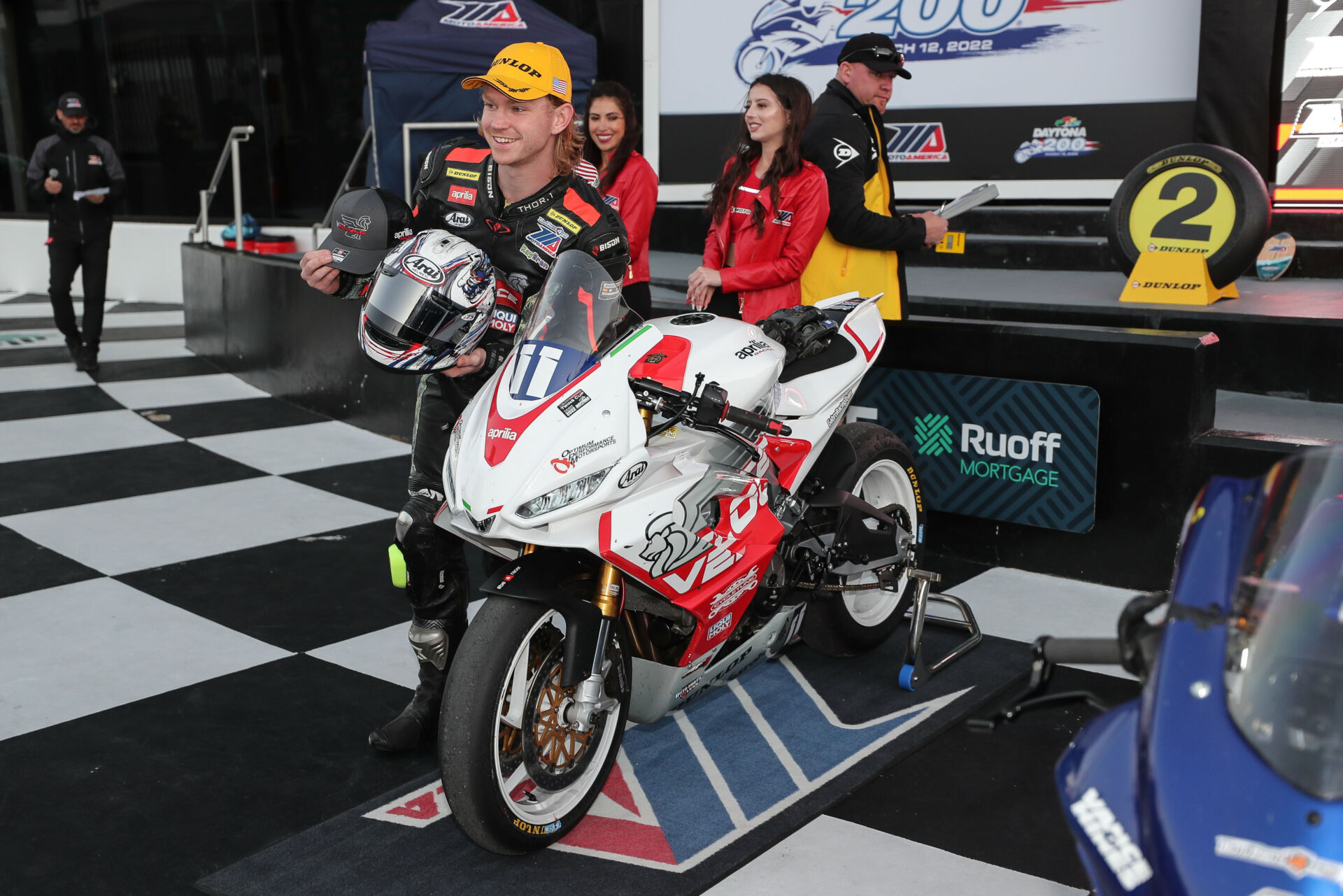 Jody Barry on the podium after Twins Cup Race Two at Daytona. Photo by Brian J. Nelson.