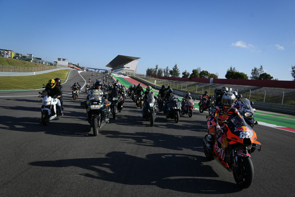 Miguel Oliveira (88) leading a parade of fans on a lap of Algarve International Circuit. Photo courtesy Dorna.