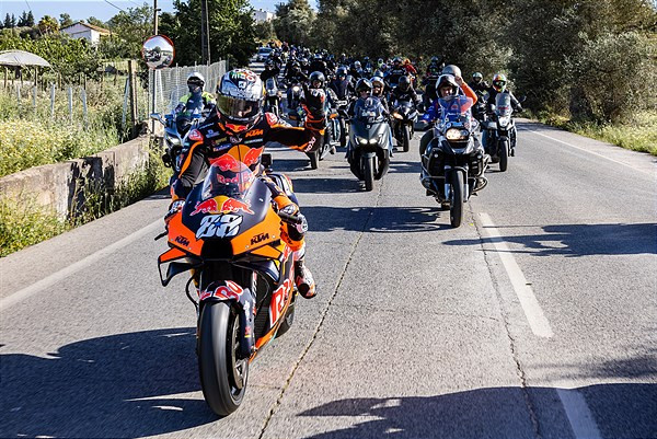 Miguel Oliveira (88) leads a pre-race fan parade from Portimao to Algarve International Circuit, in Portugal. Photo courtesy KTM Factory Racing.