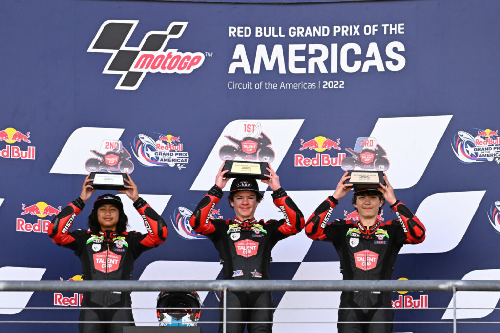 North America Talent Cup Race Two winner Jesse James Shedden (center), runner-up Alex Enriquez (left), and third-place finisher Alessandro Di Mario (right) on the podium at COTA. Photo courtesy Dorna.