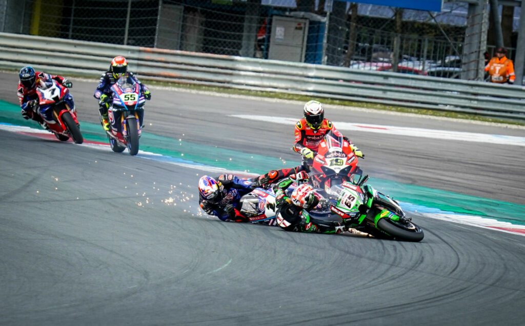 Jonathan Rea (65) and Toprak Razgatlioglu (1) crashed out of World Superbike Race Two. Alvaro Bautista (19). Andrea Locatelli (55), and Iker Lecuona (7) are eyewitnesses. Photo courtesy Dorna WorldSBK Press Office.