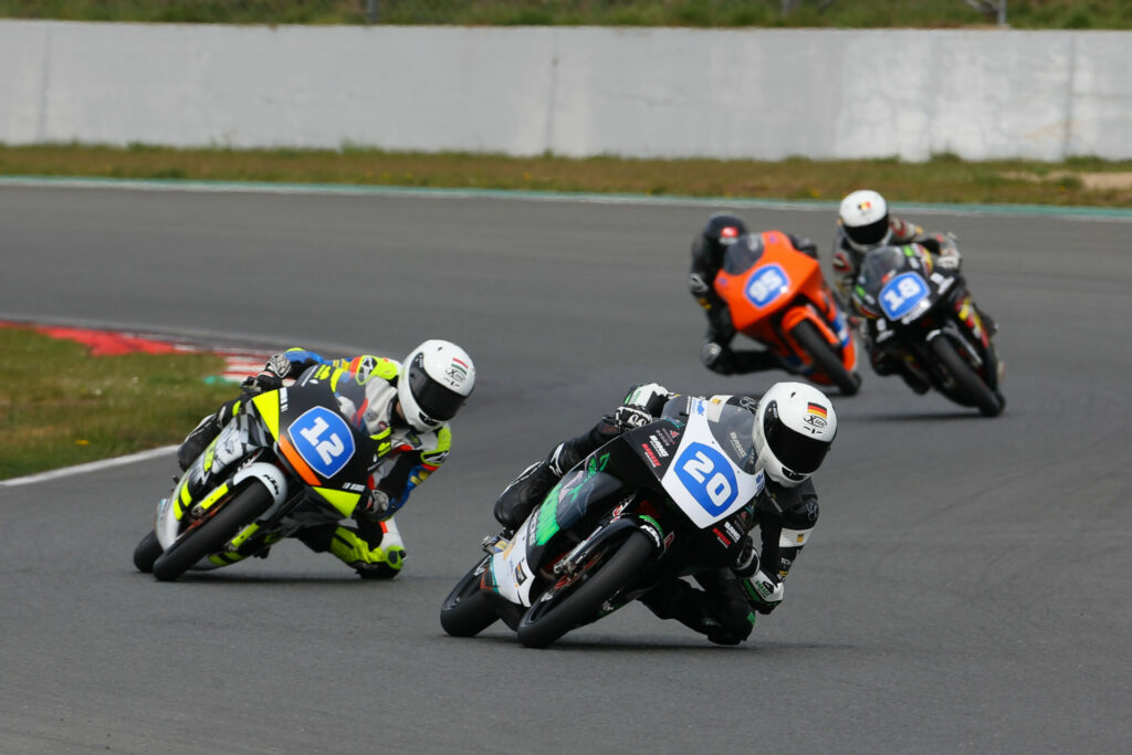Germany's Dustin Schneider (20), seen here leading Martin Vincze (12) and others, posted the quickest lap time during the Northern Talent Cup pre-season test. Photo courtesy Dorna.