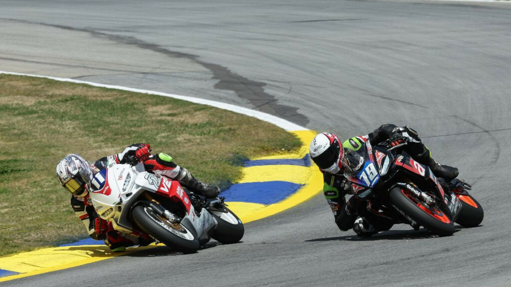 Jody Barry (11) battled Teagg Hobbs (79) throughout the Twins Cup race with Barry ultimately taking the victory. Photo by Brian J. Nelson, courtesy MotoAmerica.