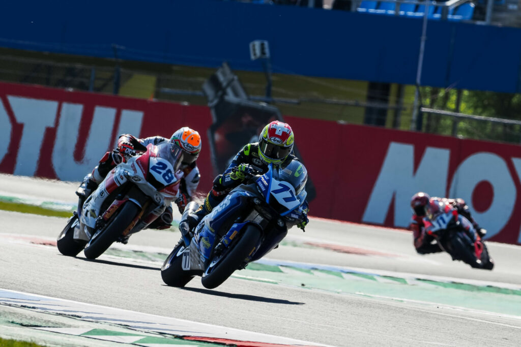 Dominique Aegerter (77) leading Glenn Van Straalen (28) and Nicolo Bulega (11) World Supersport Race One at Assen. Photo courtesy Dorna.