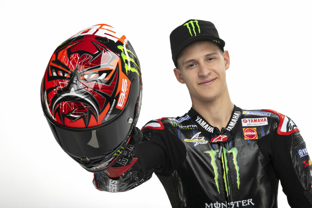 A rider gets paid by helmet and leather manufacturers to wear and endorse their bransd. Fabio Quartararo is backed by Alpinestars and Scorpion helmets, among others. Photo courtesy Monster Energy Yamaha.