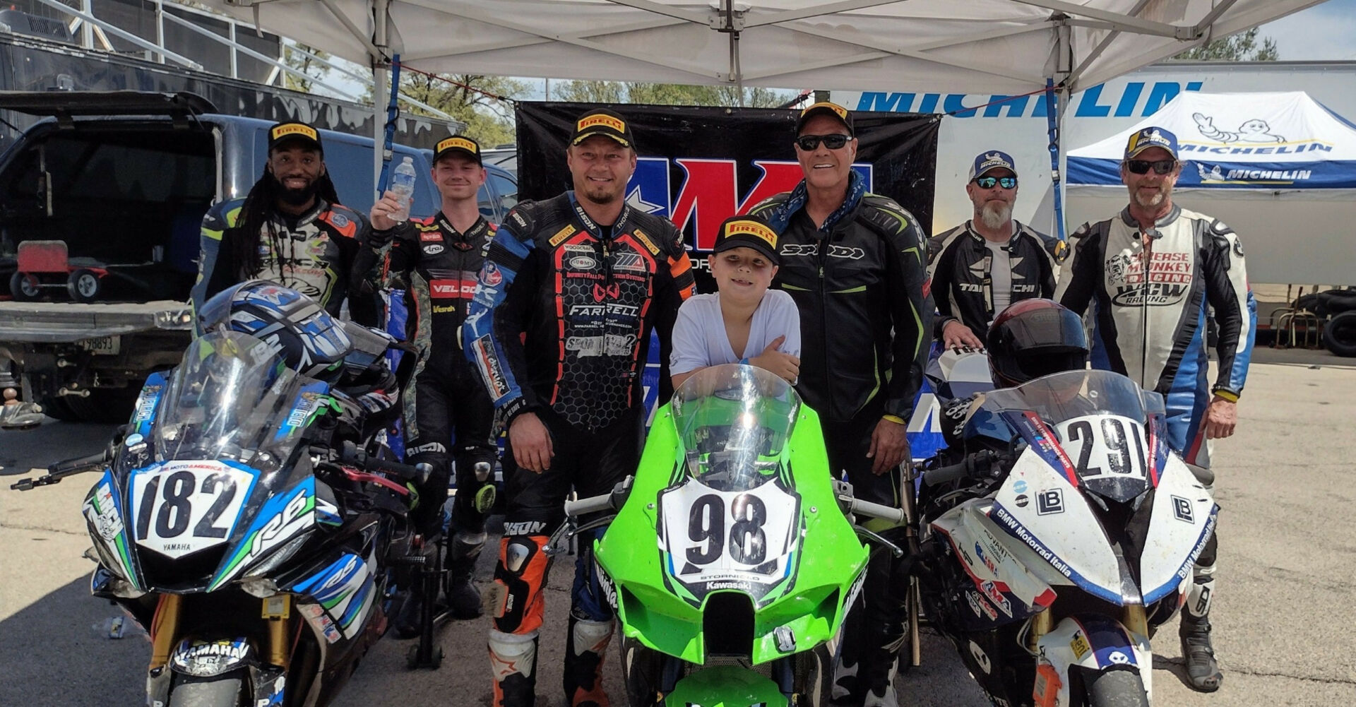 (From left) Birch Racing's Dorsey Birch and Jody Barry; Martinez Motorsports GTO's Tony Storniolo, Levi Martinez (Crew Chief), and Calvin Martinez; Grease Monkey Racing's Stephen Hoffman and Eric Helmbach on the overall ASRA Team Challenge podium at Blackhawk Farms Raceway. Photo courtesy ASRA.