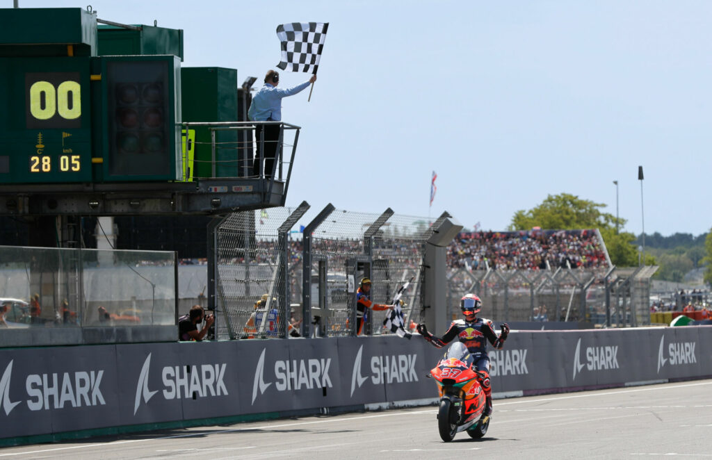 Augusto Fernandez (37) taking the checkered flag at Le Mans. Photo courtesy Dorna.