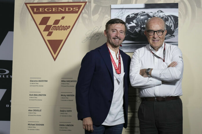 MotoGP Legend Max Biaggi (left) with Dorna CEO Carmelo Ezpeleta (right), Photo courtesy Dorna. MotoGP Legend Max Biaggi (left) with Dorna CEO Carmelo Ezpeleta (right), Photo courtesy Dorna.