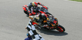 Danilo Petrucci (9) attempting to go around the outside of Mathew Scholtz (11) on the final lap of MotoAmerica Medallia Superbike Race Two at VIR. Petrucci crashed immediately after this photo was taken. Photo by Brian J. Nelson, courtesy Ducati North America.